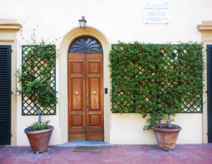 The facade or entrance of Poggio Imperiale Apartments