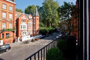 a view of a city street with buildings and cars at Blakes Hotel in London