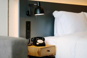 Pentahotel Hong Kong, Tuen Mun客房内的一张或多张床位