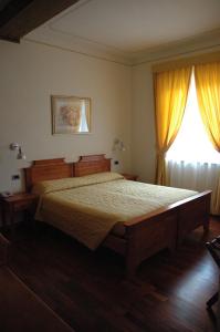 Letto o letti in una camera di Hotel Rutiliano