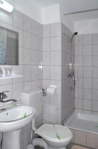 Koupelna v ubytování Hotel Sanda