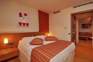 Postel nebo postele na pokoji v ubytování Astros Beach Boutique Hotel