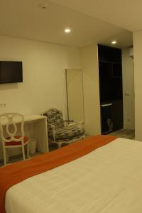 Letto o letti in una camera di Art'Otel Barcelos