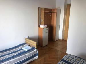 Una cama o camas en una habitación de Apartman Brubnjak