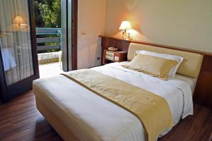 Postel nebo postele na pokoji v ubytování Hotel Bellavista