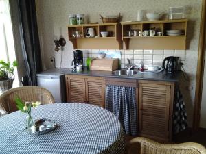 A kitchen or kitchenette at de Wylgepleats