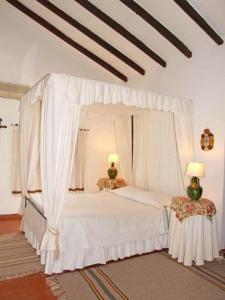 Кровать или кровати в номере Monte dos Aroeirais