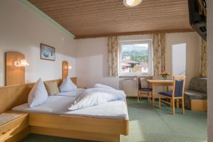 Cama o camas de una habitación en Landgasthof Pfarrwirt