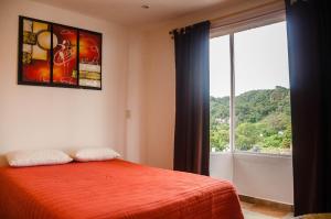 Posteľ alebo postele v izbe v ubytovaní Hospedaje Casa Verde