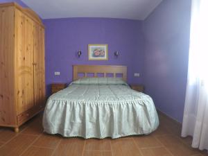 Postel nebo postele na pokoji v ubytování Hotel Alonso
