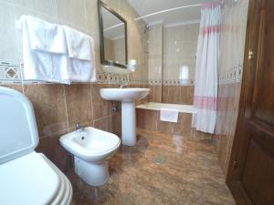 Koupelna v ubytování Hotel Alonso