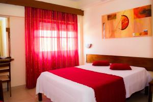 Letto o letti in una camera di Aparthotel Avenida