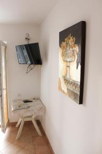 TV in/ali zabaviščno središče v nastanitvi Apartmani Vukcevic
