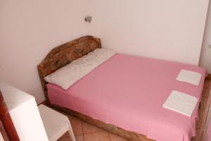 Postelja oz. postelje v sobi nastanitve Apartmani Vukcevic