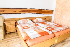 Posteľ alebo postele v izbe v ubytovaní Landgasthof Seyrlberg