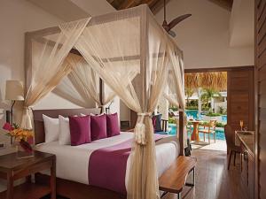 Voodi või voodid majutusasutuse Secrets Cap Cana Resort & Spa - Adults Only - All Inclusive toas