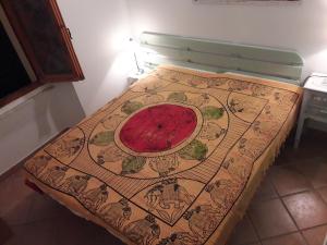 Posteľ alebo postele v izbe v ubytovaní Casa vacanze della Maddalena