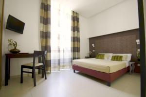 Posteľ alebo postele v izbe v ubytovaní Interno 5 B&B