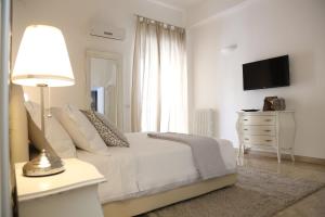 TV a/nebo společenská místnost v ubytování Dimi House