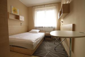 Posteľ alebo postele v izbe v ubytovaní Standard Delegacyjny Bed & Breakfast