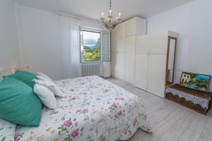 Posteľ alebo postele v izbe v ubytovaní Casa Amelia