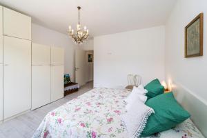 A bed or beds in a room at Casa Amelia