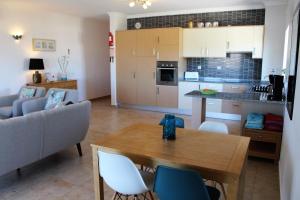 Кухня или мини-кухня в Âncora Boutique Apartments
