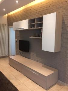A kitchen or kitchenette at La Porta Nel Giardino