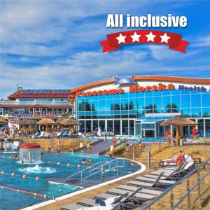an all inclusive resort with a swimming pool at Aquapark Health Resort & Medical SPA Panorama Morska All Inclusive in Jarosławiec