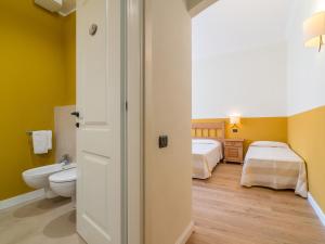 Postel nebo postele na pokoji v ubytování Charming Rooms Opuntia + 37 fotografií
