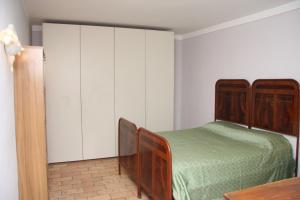 A bed or beds in a room at Villa del Cardinale