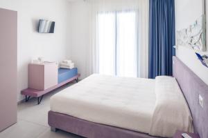 Postel nebo postele na pokoji v ubytování B&B El Gatt