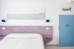 Postel nebo postele na pokoji v ubytování B&B El Gatt