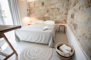 Ένα ή περισσότερα κρεβάτια σε δωμάτιο στο Settegrana