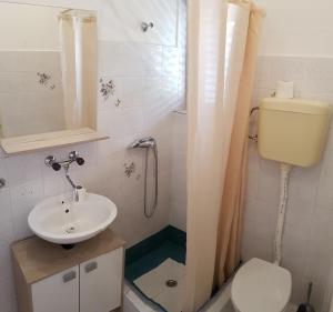 Koupelna v ubytování Apartments Milatic
