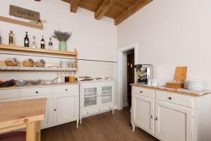 Køkken eller tekøkken på Bed and Breakfast Villa Maria