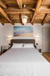 En eller flere senge i et værelse på Bed and Breakfast Villa Maria