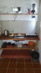 Una cocina o kitchenette en Cabañas Las Victorias