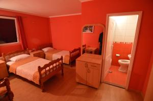 Voodi või voodid majutusasutuse Hotel 24 jul toas