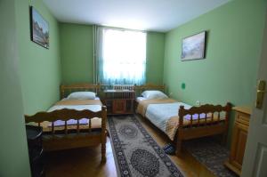 Postel nebo postele na pokoji v ubytování Hotel 24 jul