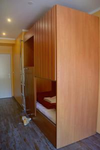 Postel nebo postele na pokoji v ubytování Do Step Inn Central - Self-Service-Hostel