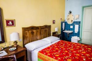 Postel nebo postele na pokoji v ubytování Hotel Il Bargellino