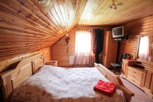 Posteľ alebo postele v izbe v ubytovaní Guest House Arnika