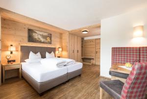 Postel nebo postele na pokoji v ubytování Hotel Augarten