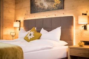 Postel nebo postele na pokoji v ubytování Hotel Augarten