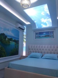 Hotel Buza 객실 침대