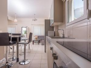 Kuchyň nebo kuchyňský kout v ubytování Aegean Residence - F & B Summer Collection