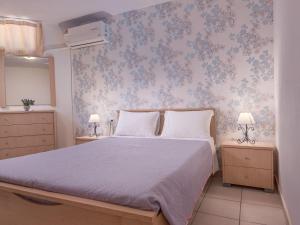Postel nebo postele na pokoji v ubytování Aegean Residence - F & B Summer Collection