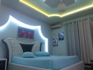 Hotel Buza 객실 침대