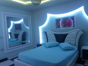 Hotel Buza 객실 침대